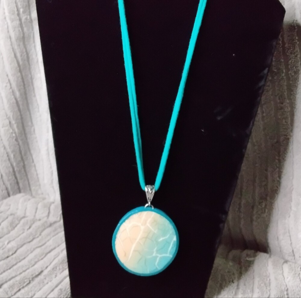 Turquiose Blue And Peach Pendant With Polish Silver Bezal On Silk Cord